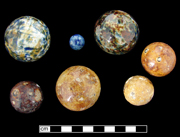 These seven Bennington or “Bennies” marbles were all found in the cellar of a collapsed building.Note the round pockmarks typical of Benningtons on several of the marbles - click on image to see larger view.